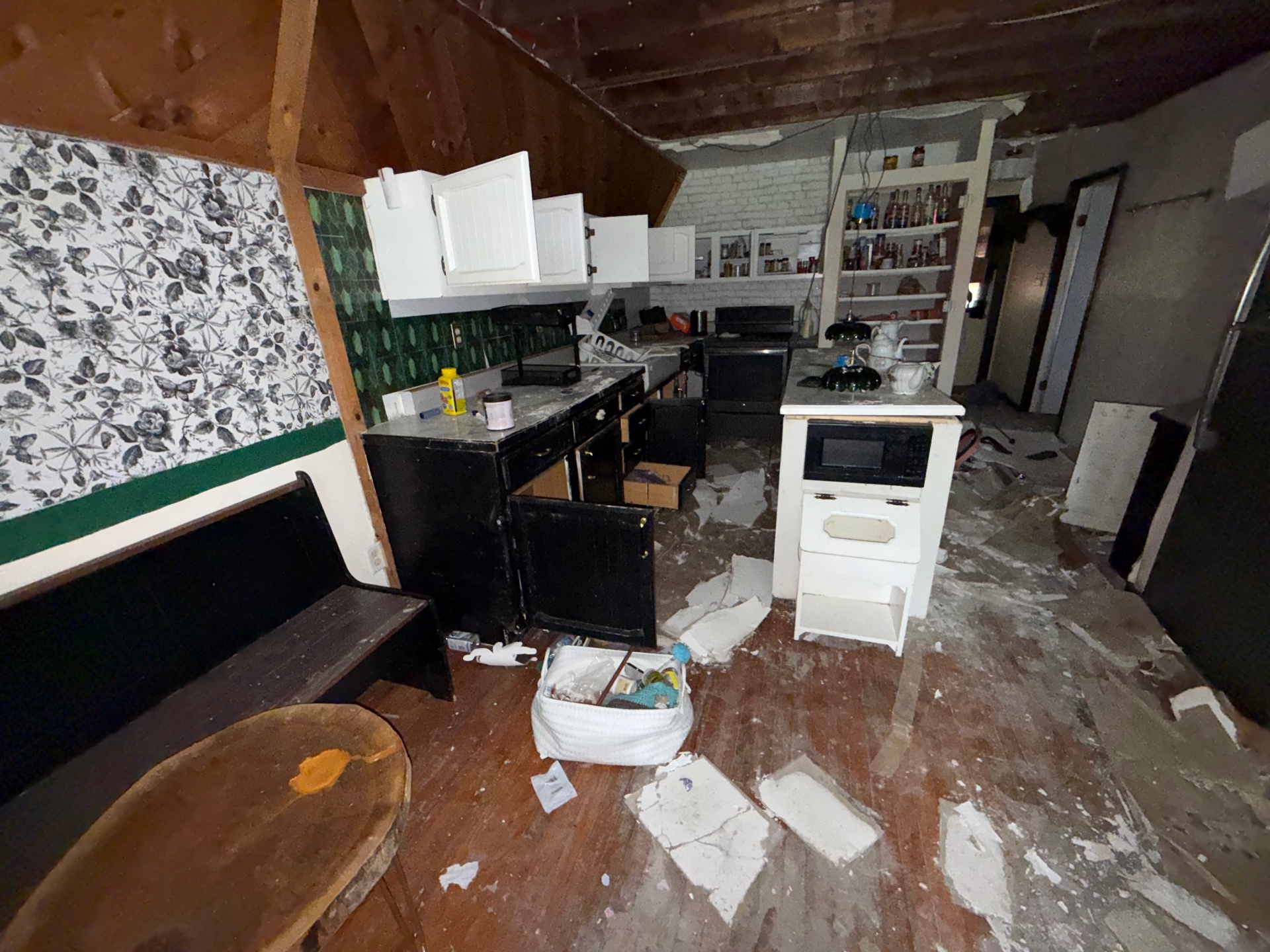 Damaged kitchen before professional water damage cleanup and debris removal in Central Ohio