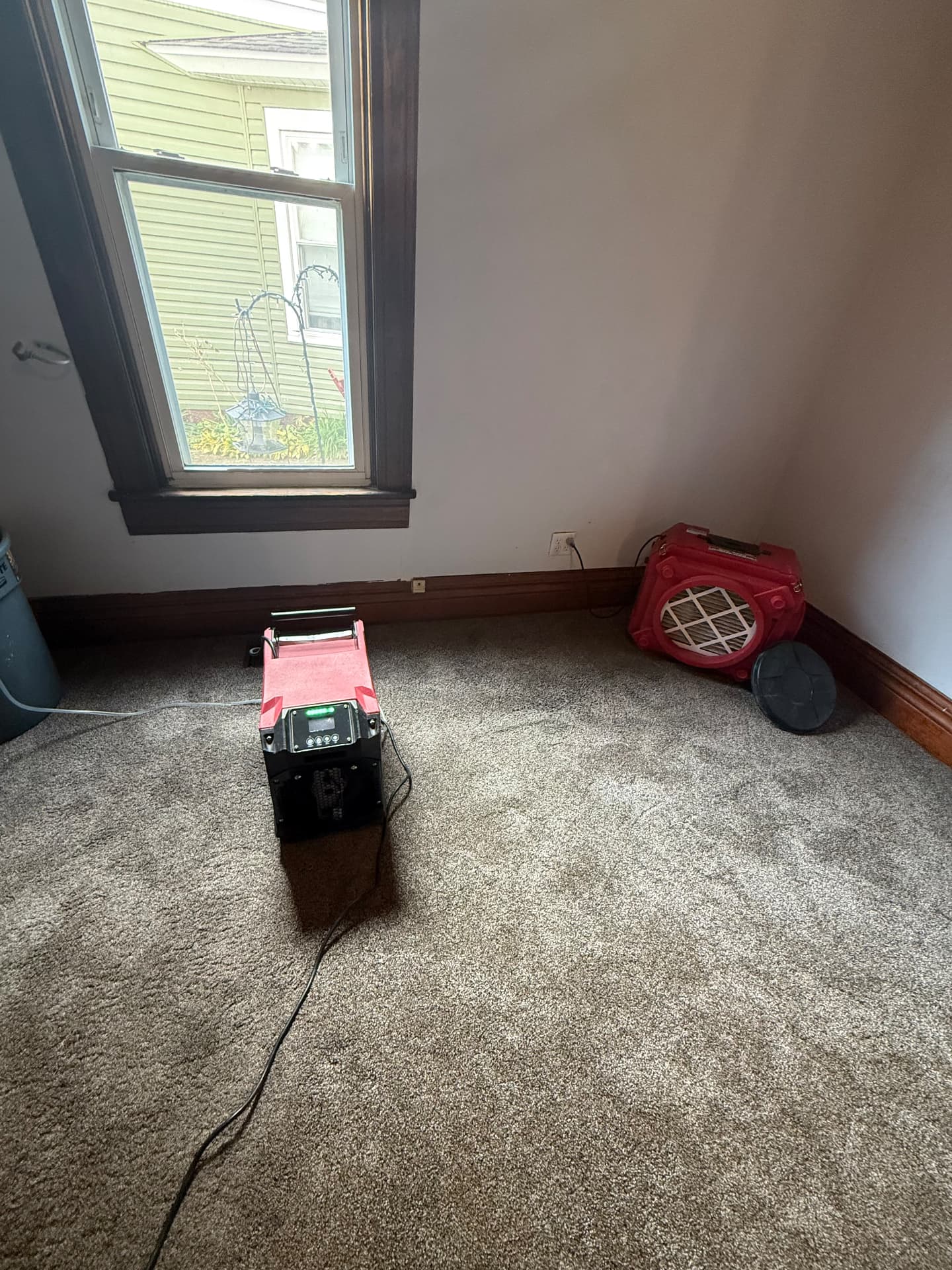 Air scrubber and dehumidifier running during a mold remediation job