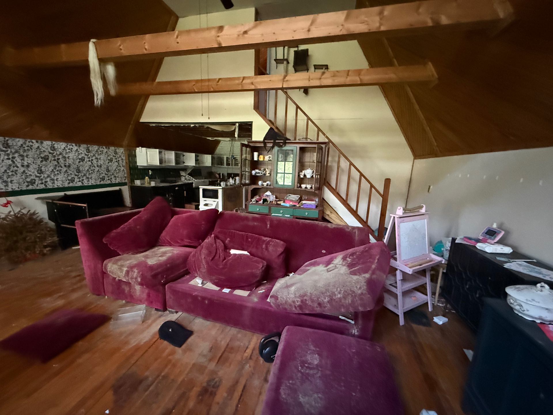 Water-damaged living room before debris removal and structural drying by a Central Ohio restoration crew